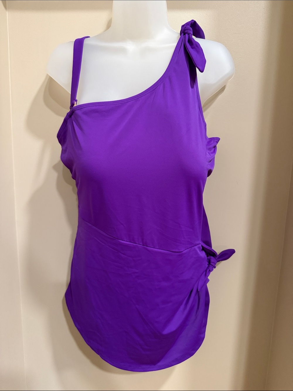 Swimsuits For All Purple One-Shoulder with Tie Details. Adjustable front sarong